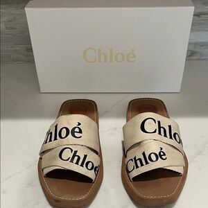 CHLOE: Woody Flat Slides in Black & White